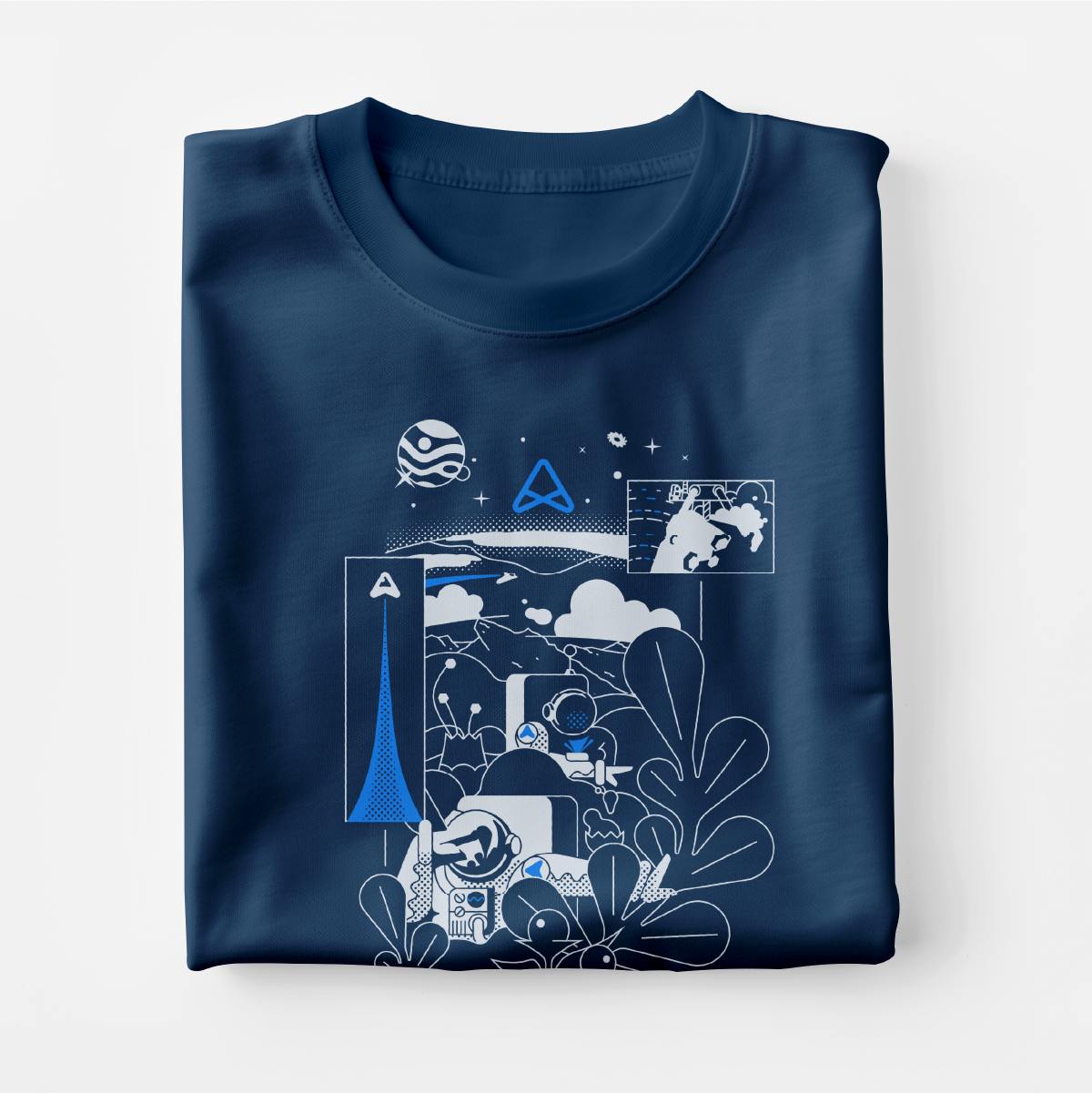 Photograph of a folded t-shirt with a space exploration illustration printed on it in white and blue